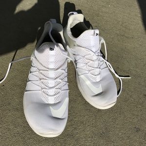 White Nike Darwin Tennis Shoes
